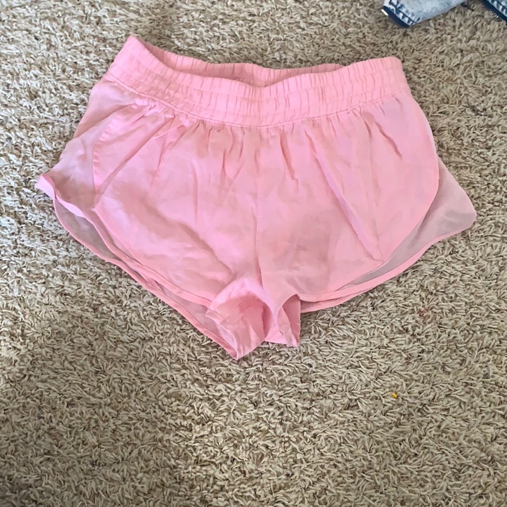 Pink running shorts